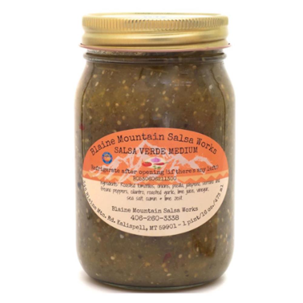 A jar of green salsa with a gold lid.