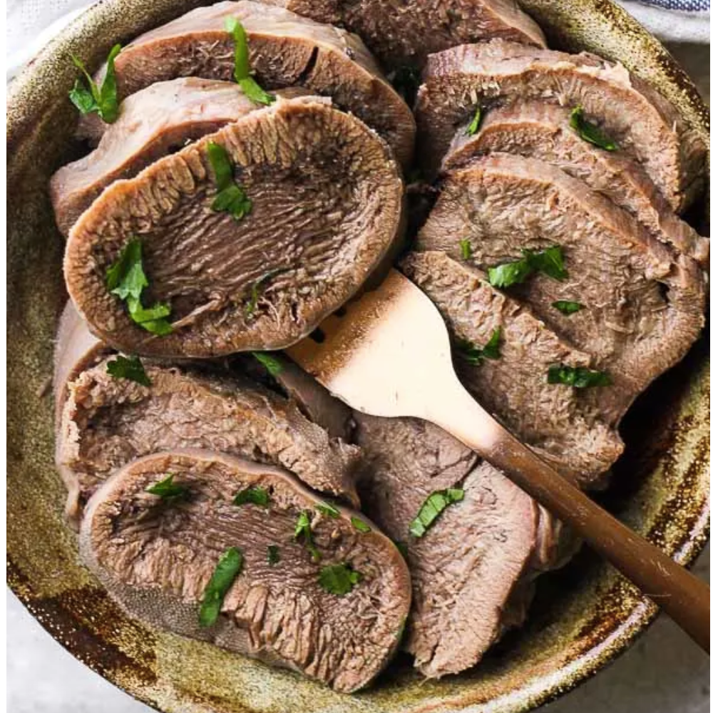 Slices of cooked beef tongue