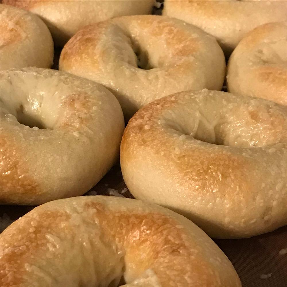 Golden bagels with cheese topping